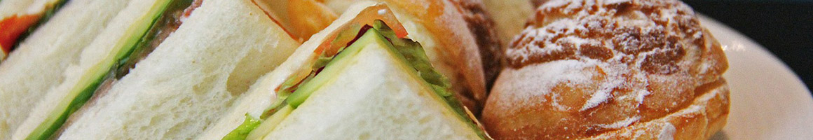 Eating Sandwich Vegetarian at Blue Heron Coffeehouse restaurant in Winona, MN.